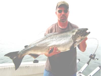 Joseph Pawelko Jr was fishing with Captain J Mickey Mc Donald of Irondequoit Bay Charters Rochester, New York. Thats where he caught this 28 pound king. The big salmon hit a Wonderbread Stinger 