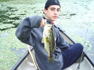 Kenny Debono and his step father launched thier canoe on Artist Lake to do a little fishing. It was a great day and the fish were really biting. Kenny was using a white fin-s and casting it into heavy cover and slowly retrieving it back when he caught this nice largemouth that had inhaled the bait