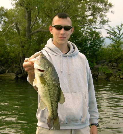 a very nice largemouth bass caught from Otisco Lake. It was caught in the middle June 2008 on a watermelon colored Berkley Powerbait in about 3 feet of water