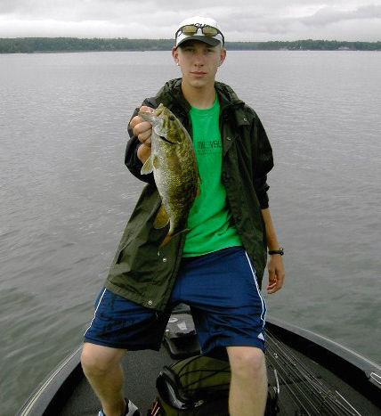 a Smallmouth Bass caught in early August 2008 on Delta Reservoir, Rome, NY. It was caught on a Texas rigged watermelon YUM Dinger in 25 feet of water